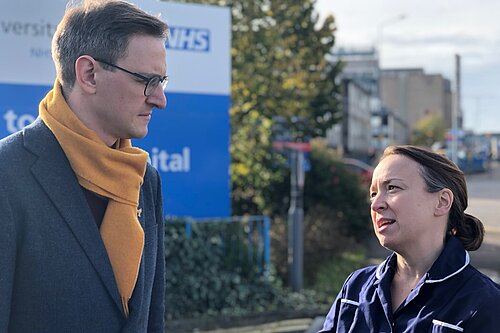 Ian talking to Alex in front of Addenbrooke's Hospital